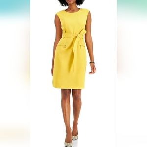 Kasper butterscotch dress with waist tie and gold zippered pockets.